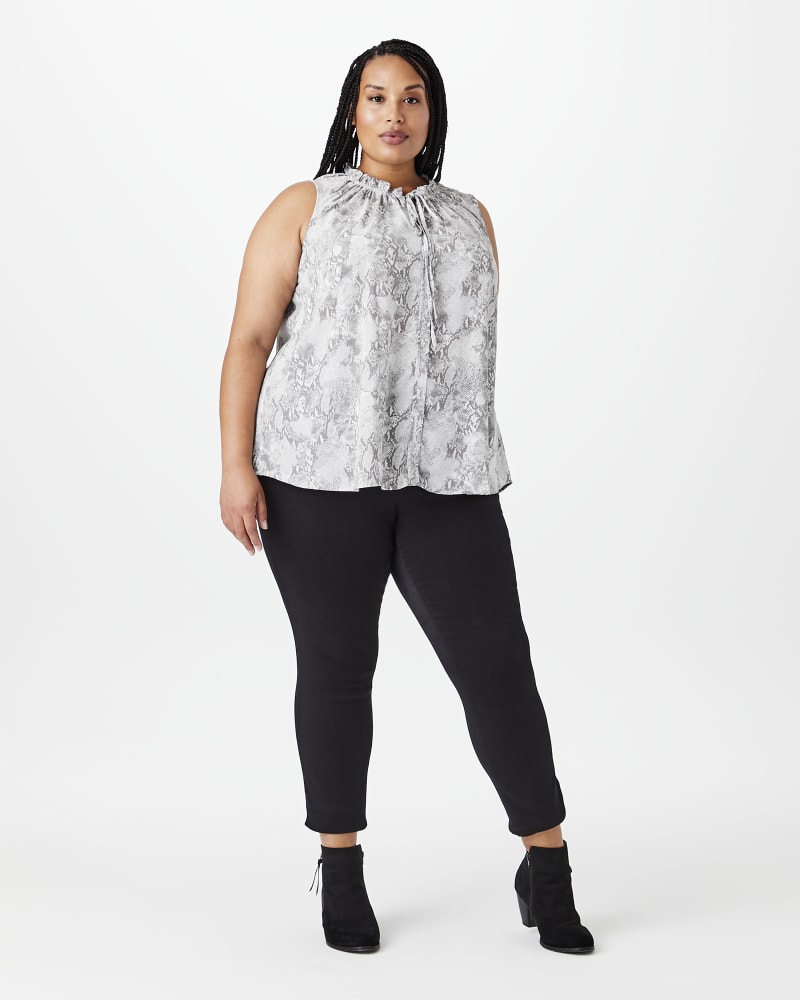 Plus size model with hourglass body shape wearing Lilie Ruffled Tie-Neck Top by Downing Studio | Dia&Co | dia_product_style_image_id:144429